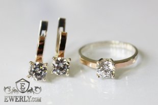 Срібні сережки і кільце з білим камінням, фото