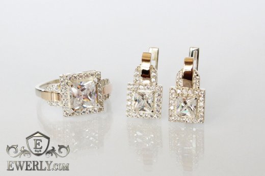 Женские серебряные серьги и кольцо с белыми камнями, фото