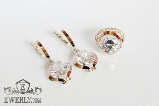 Жіночий комплект з білими каменями: сережки і кільце, фото